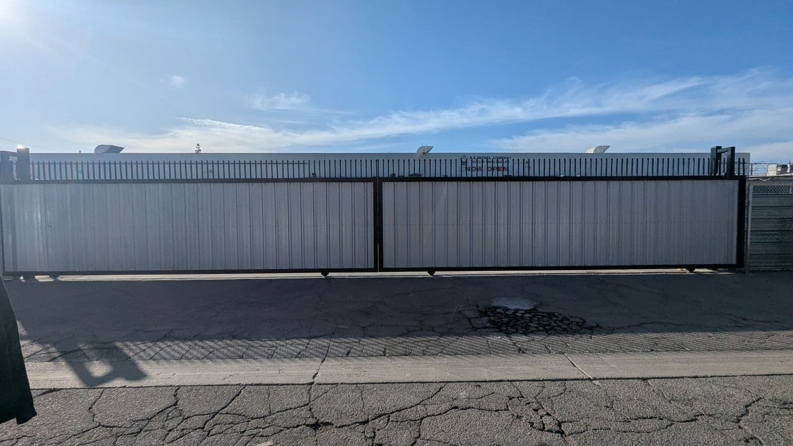 Commercial slat security gate at a business facility