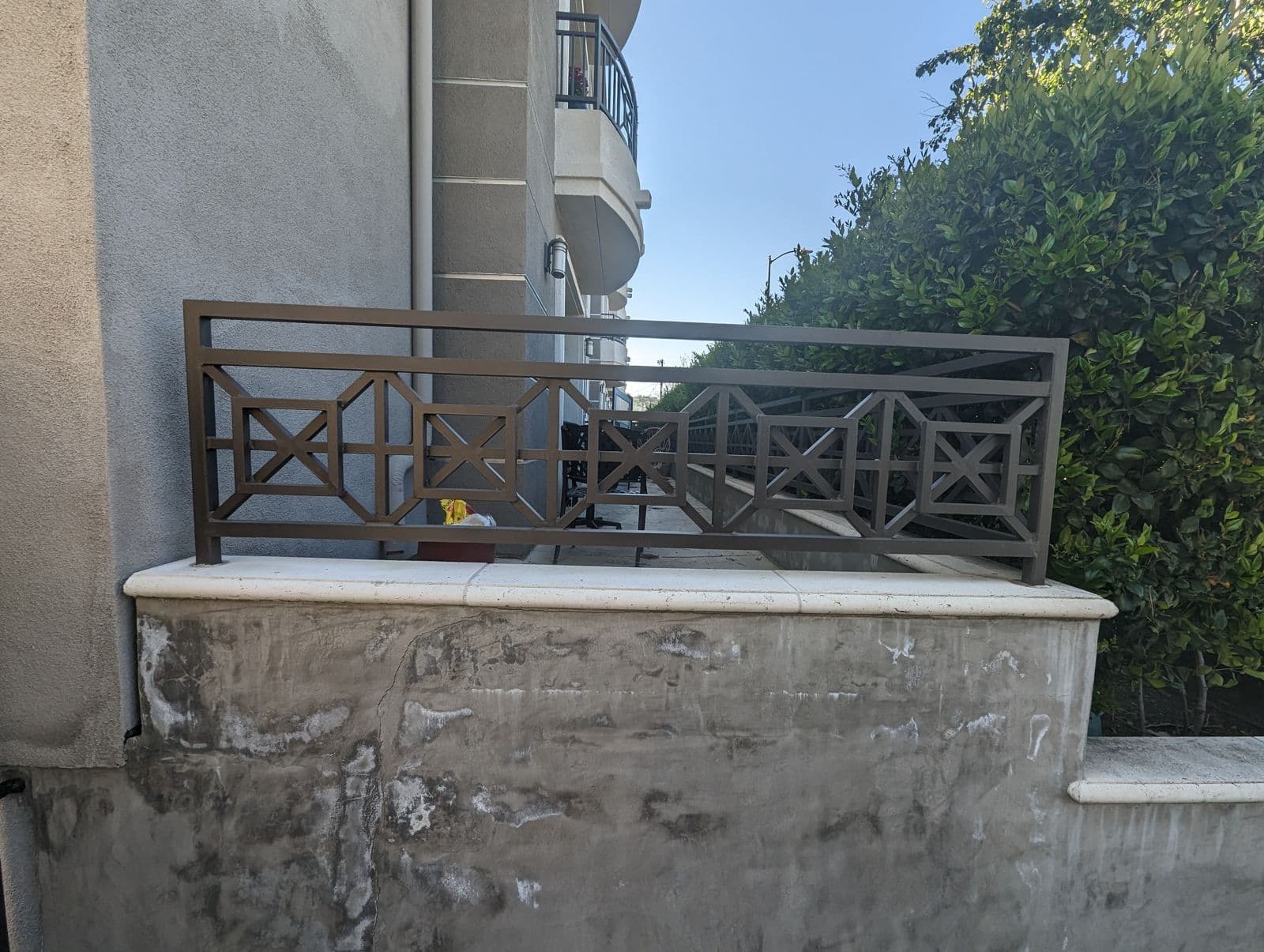 Decorative X-pattern metal railing