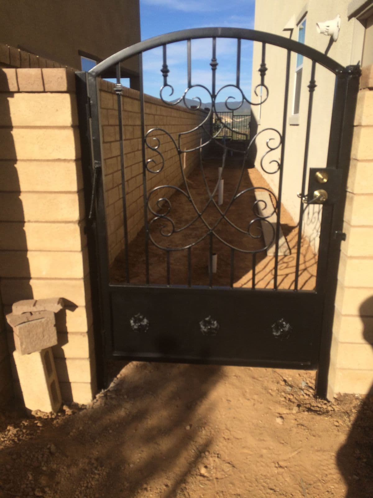 Iron gate being installed on site