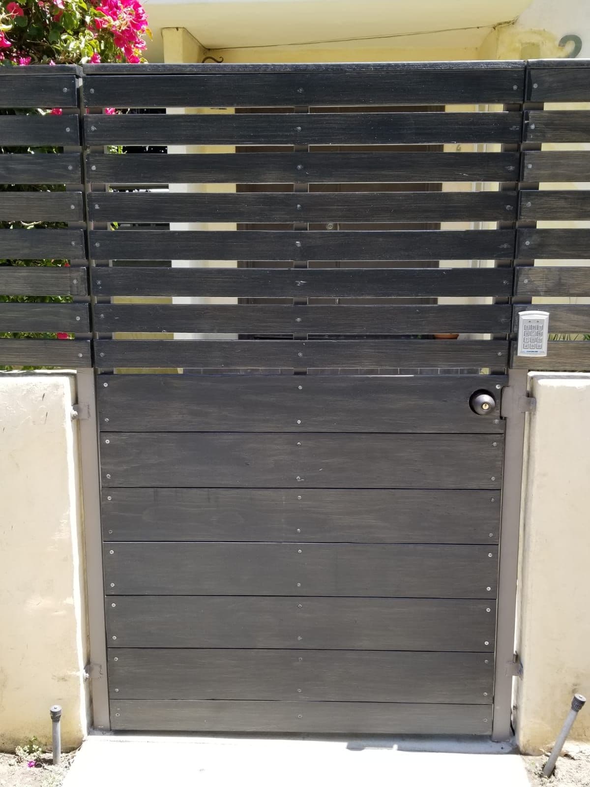 Modern wood pedestrian gate with keypad entry