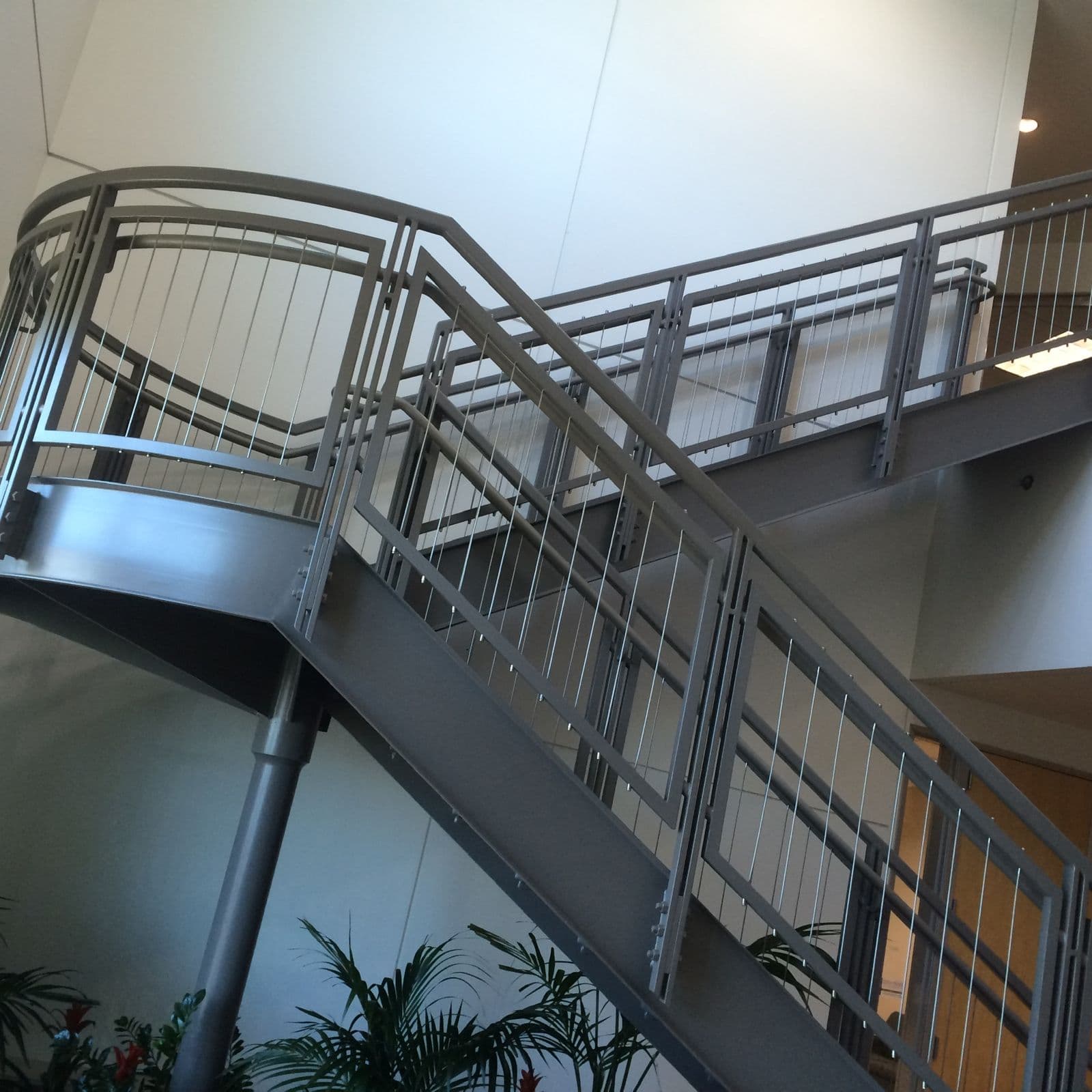 Modern steel staircase with cable railing
